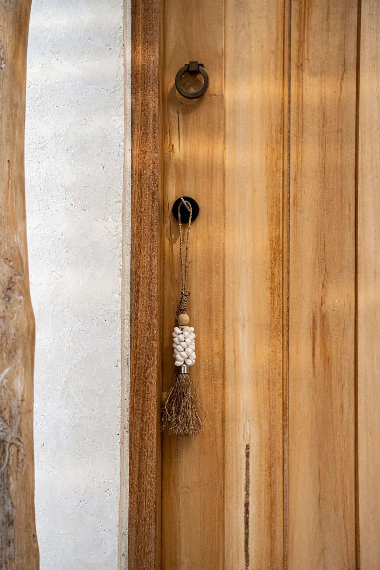 The Cowrie & Raffia Tassel — Natural, full product shot white background