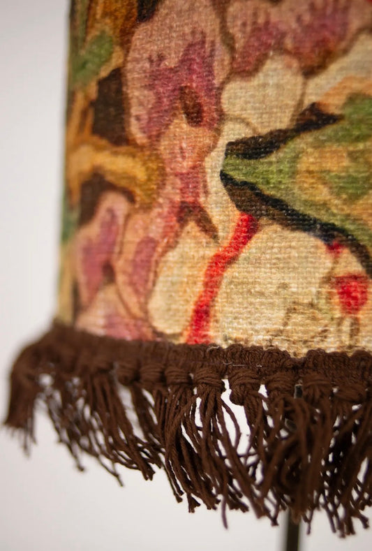 Suzette Lamp Shade — close-up of dark fringe trim and botanical tapestry weave detail