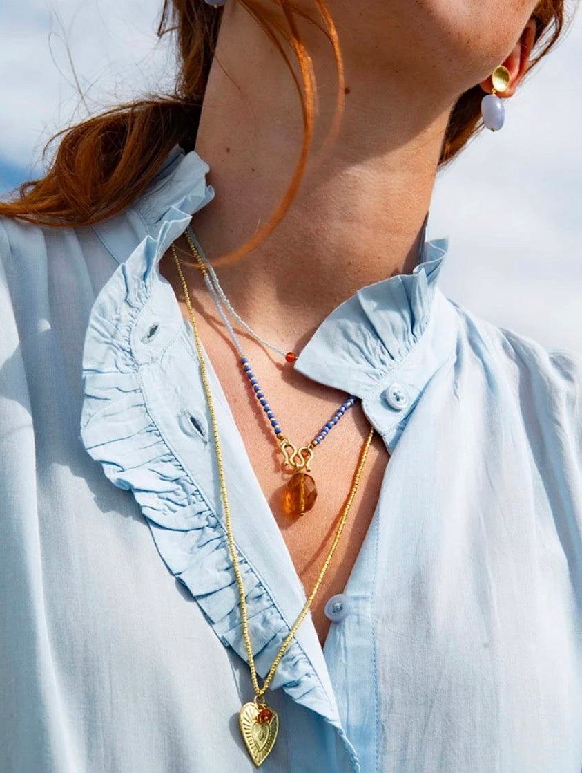 Awake Carnelian Necklace – Model wearing layered necklaces