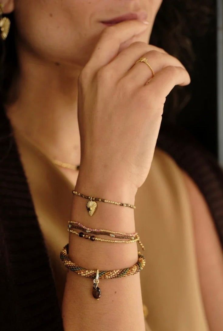Balanced Tiger Eye Bracelet – Model wearing stacked bracelets
