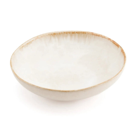 The Cascais Pasta Plate in creamy white stoneware with burnt-umber rim, side view on white background