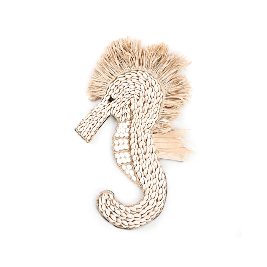 The Shell Sea Horse White — full view, handmade cowrie shell seahorse with raffia fringe crown on white background