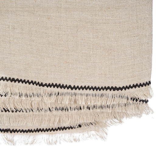The Tuscany Tablecloth — Natural Black 150×300, lifestyle on long table with ceramics