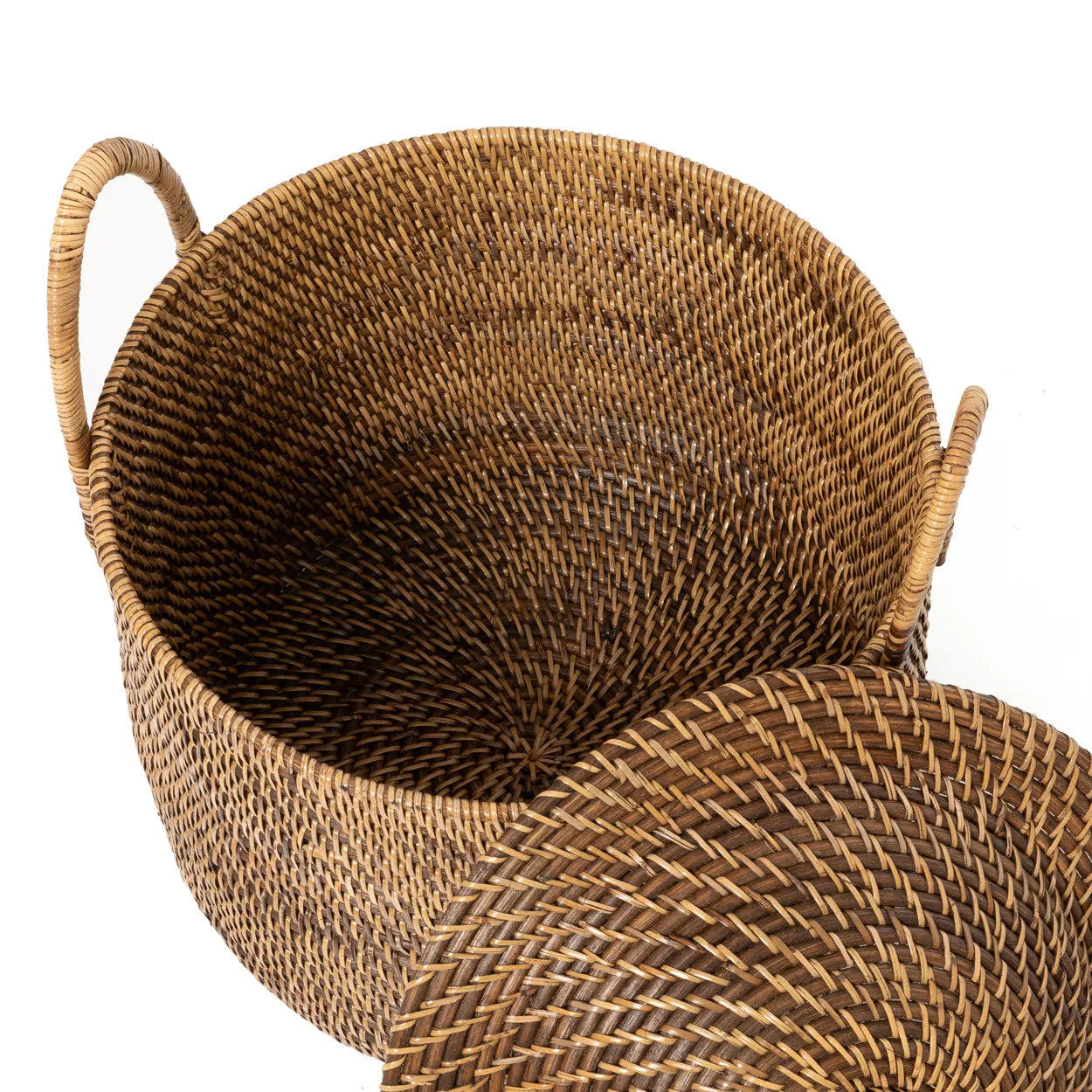 The Colonial Handles Basket styled in a warm interior with cushions and a raffia mirror