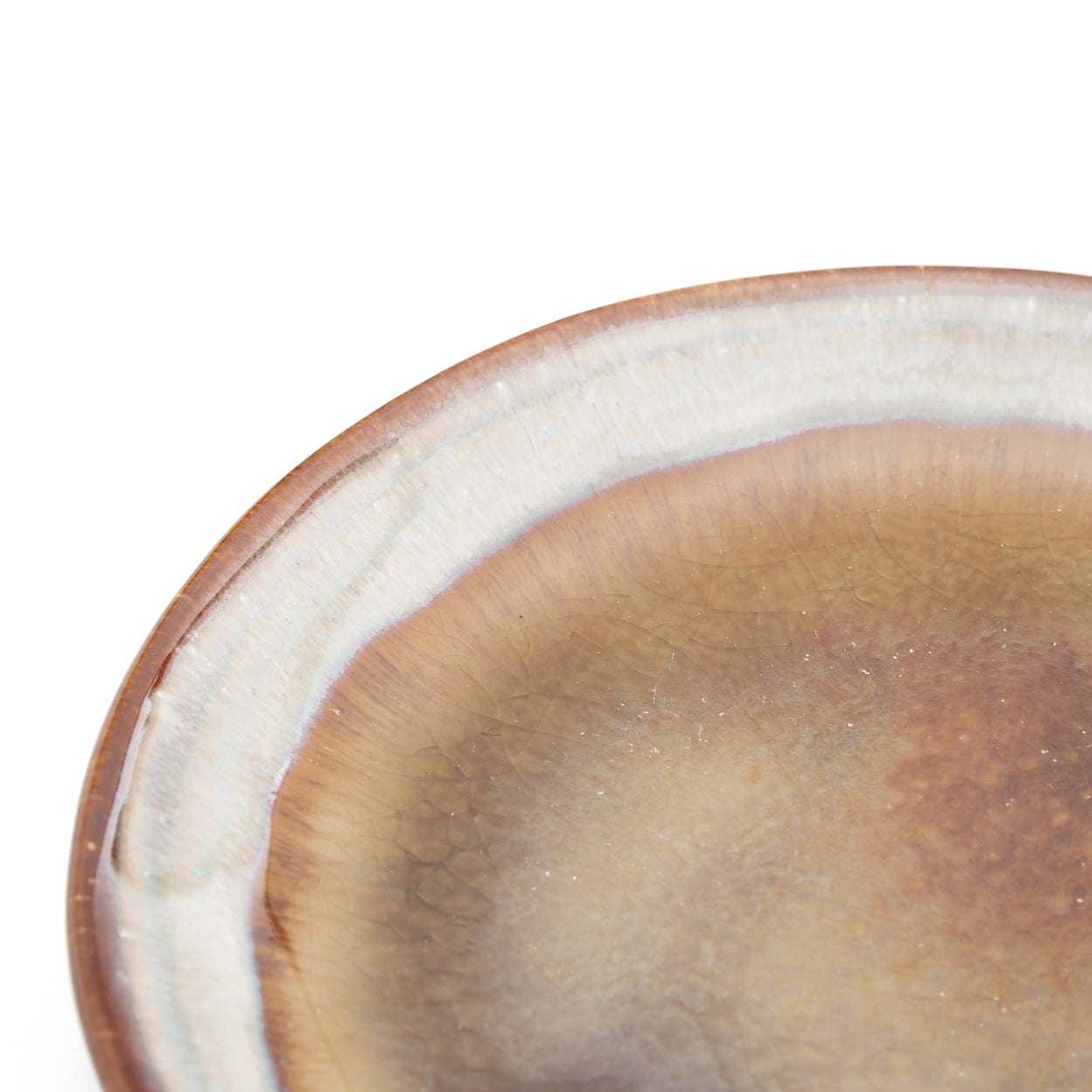Side profile of the Comporta Appetizer Plate showing the low form and crackle glaze exterior