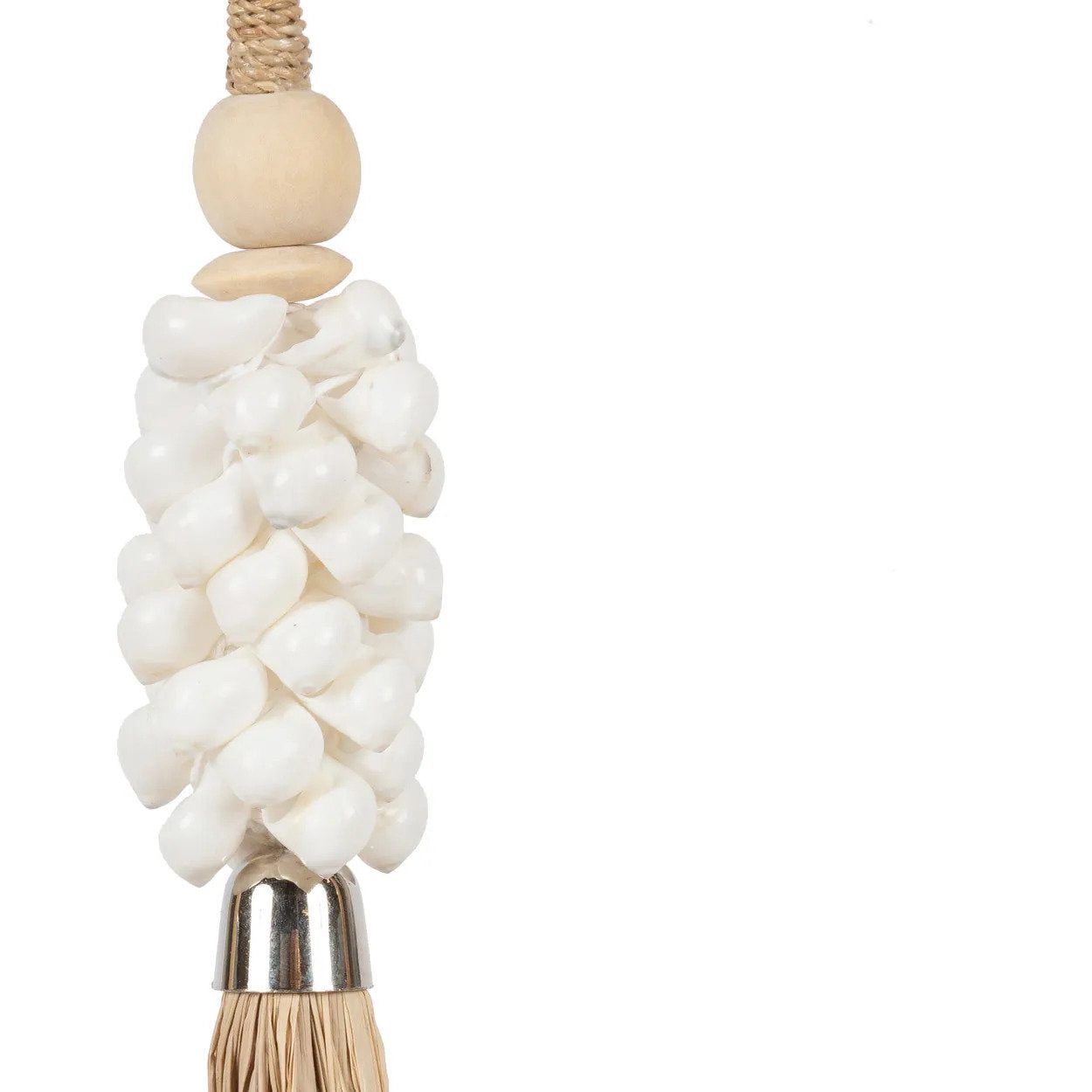 The Cowrie & Raffia Tassel — Natural, close-up of cowrie shells and wood bead