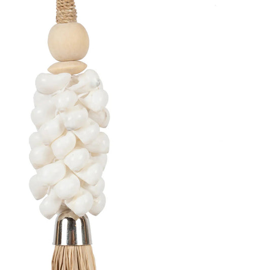 The Cowrie & Raffia Tassel — Natural, close-up of cowrie shells and wood bead