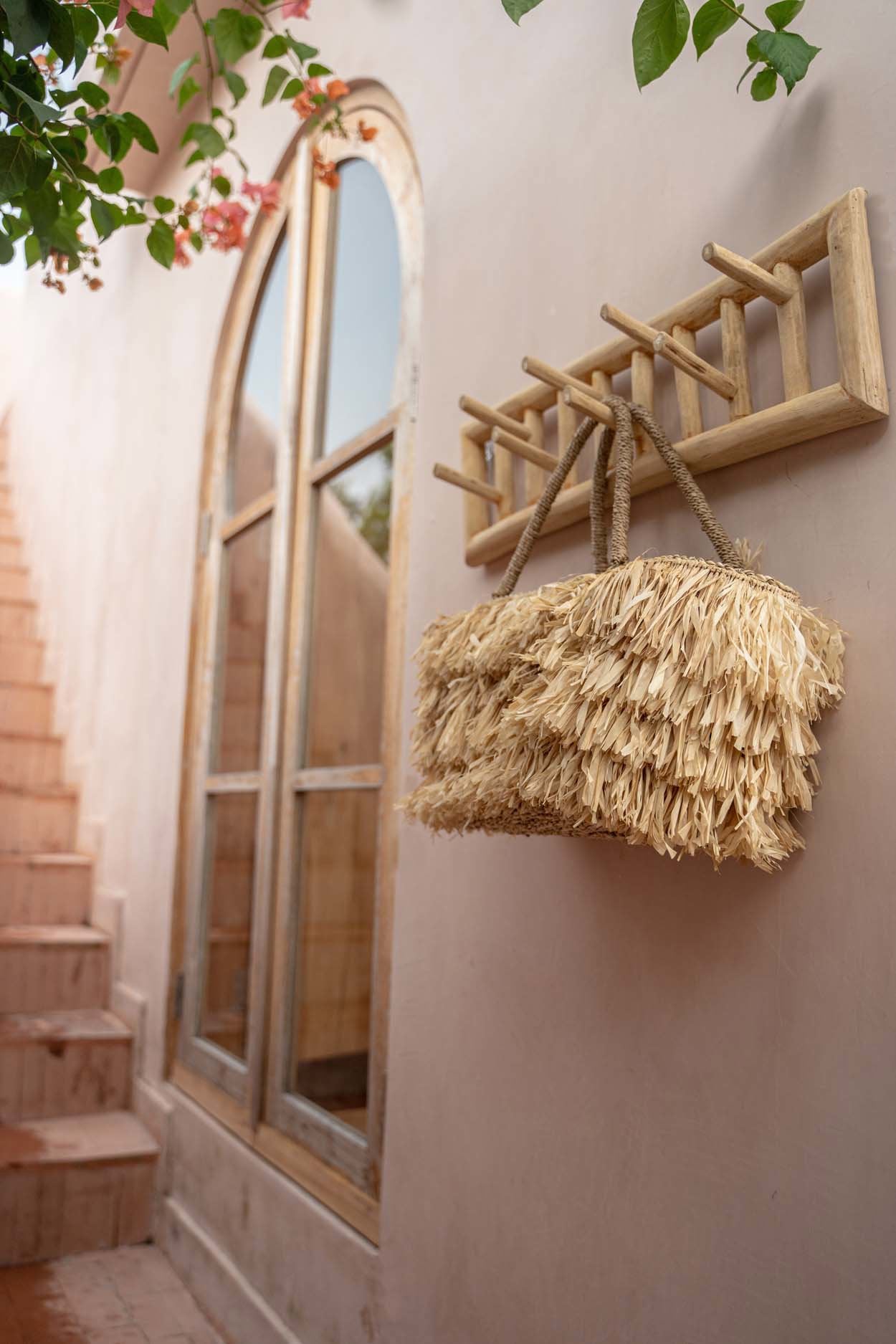 The Island Cloth Hanger — Natural, lifestyle with raffia bag