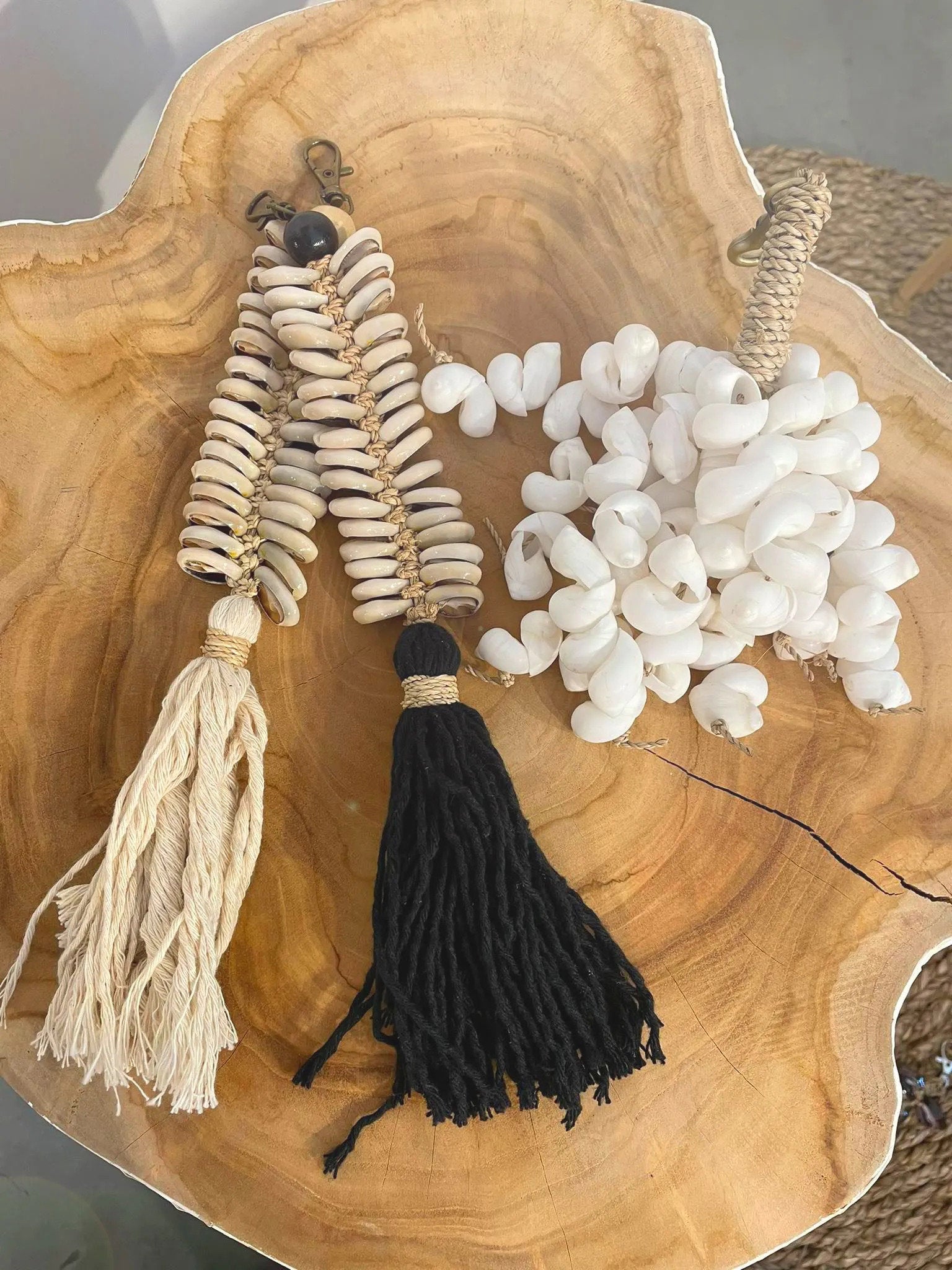 The Kai Shell Keychain — White, front view brass clasp white background