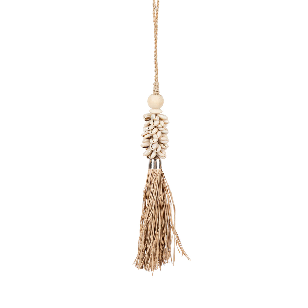 The Cowrie & Raffia Tassel — Natural, lifestyle hanging on wooden door