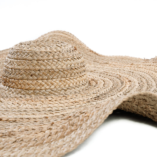 The Lolita Hat — Natural, close-up of crown and wave brim white background