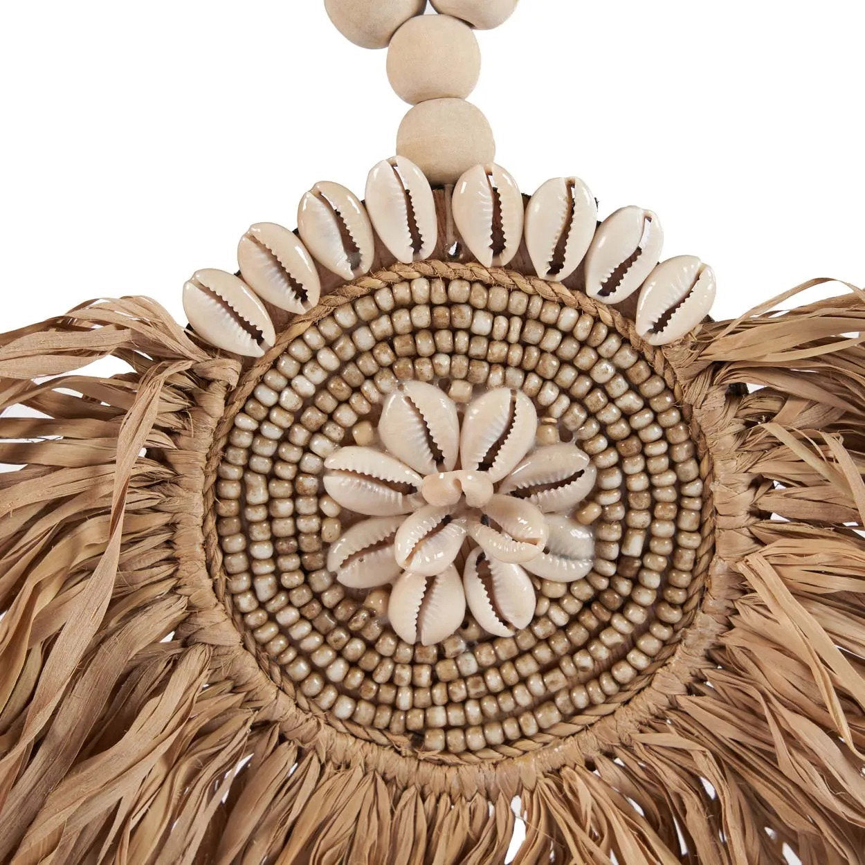 The Raffia Tajoe Tassel — Natural, full length with wood bead cord