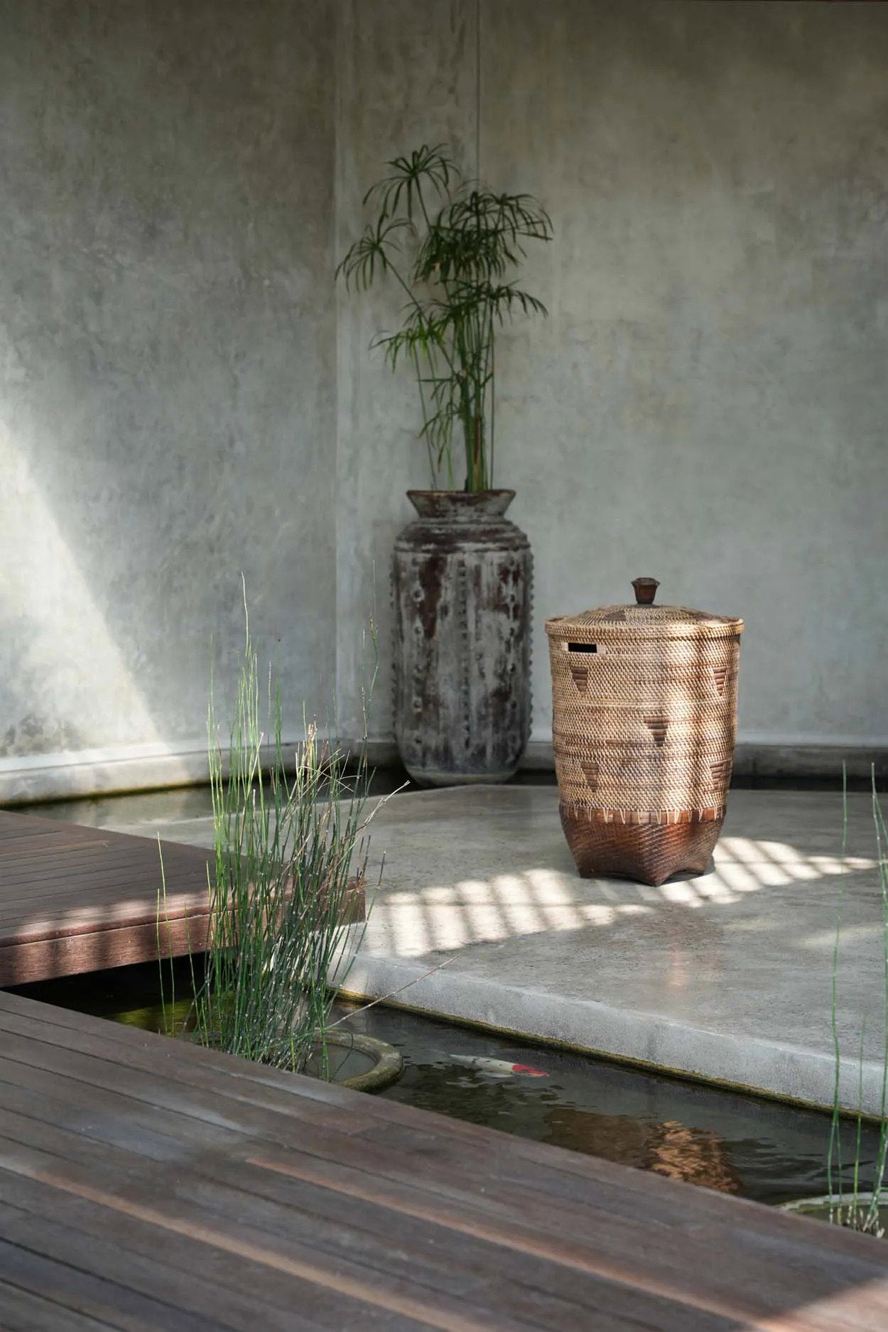 Close-up of the Colonial Laundry Basket base showing the tight rattan weave pattern