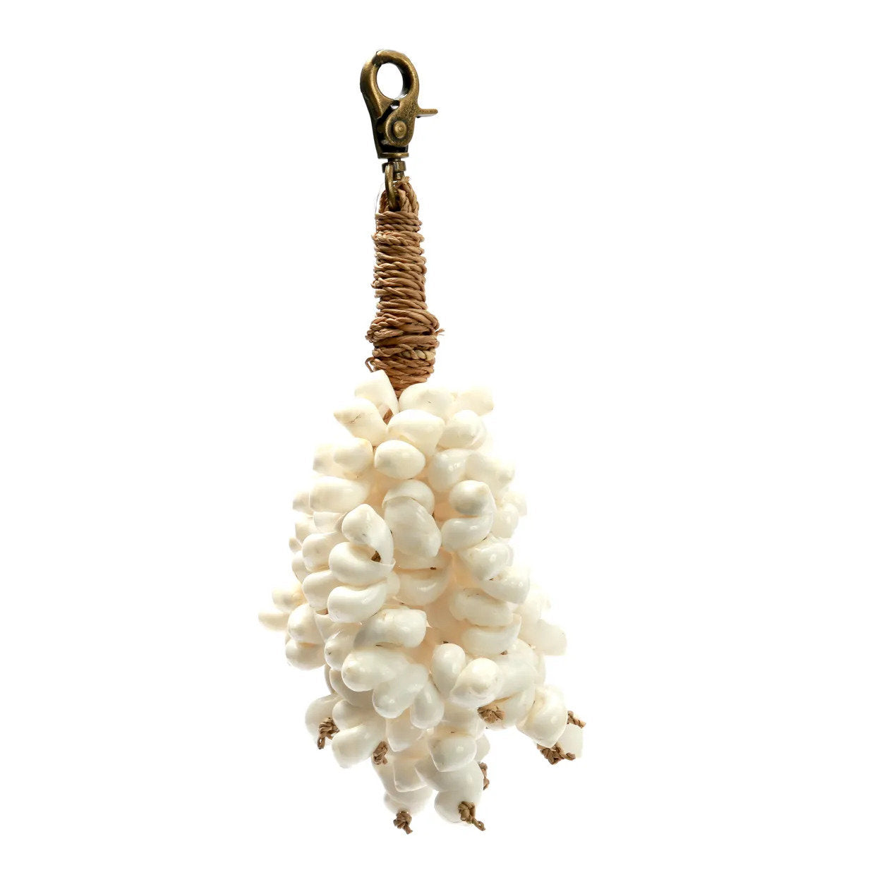 The Kai Shell Keychain — White, lifestyle in wooden bowl with other shell keychains