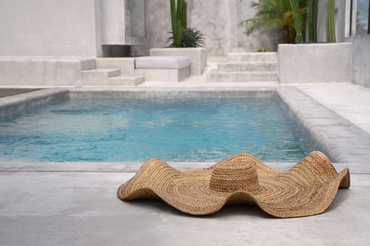 The Lolita Hat — Natural, overhead flat lay showing full brim white background