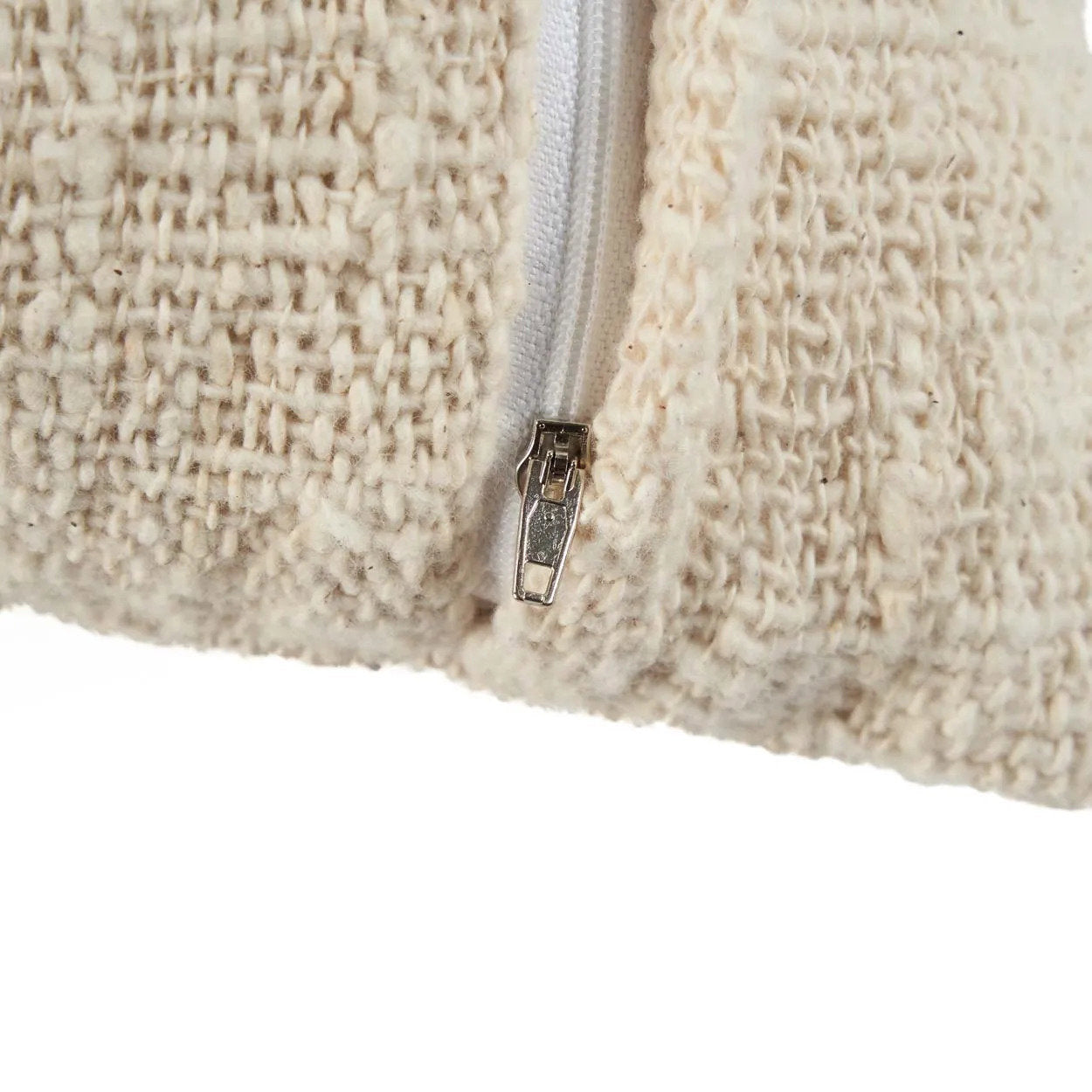 The Isla Palm Cushion Cover — corner detail showing raffia weave texture and zip