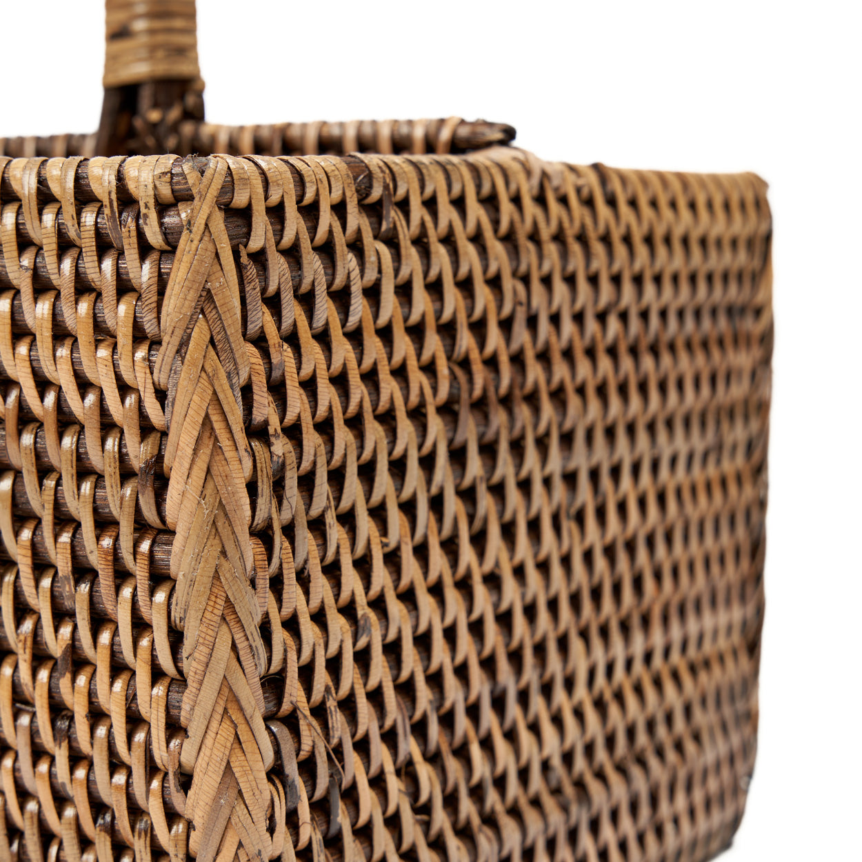 The Rattan Cutlery Caddy N°2 — Natural Brown, close-up of woven body and corner detail