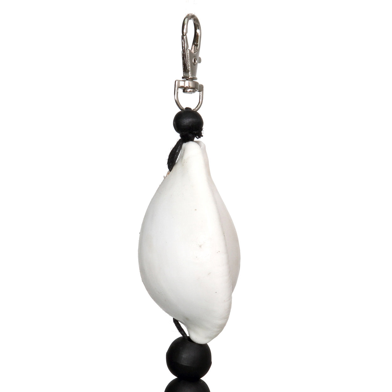 The Togian Keychain — Black White, group shot all keychain variants on black stand