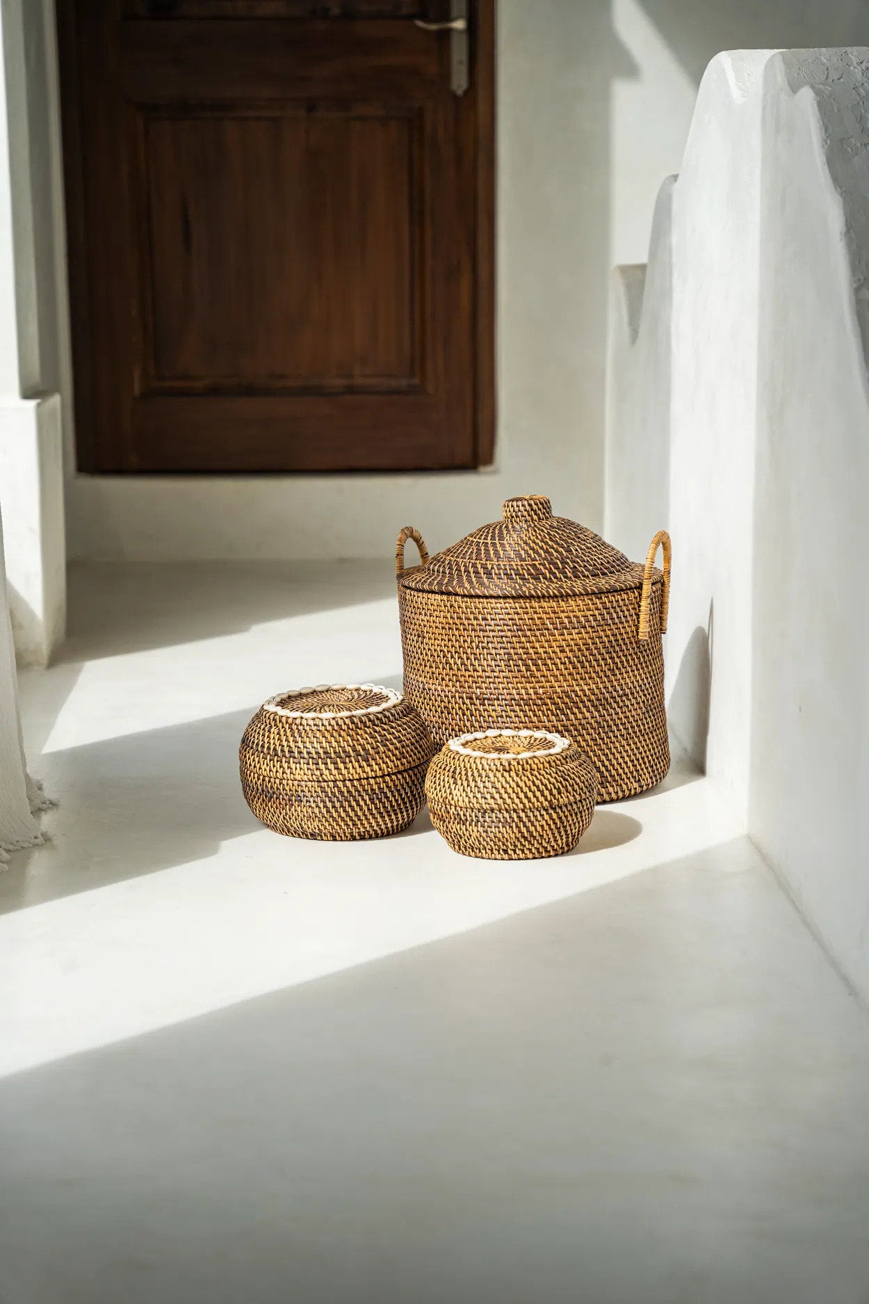 Close-up of the Colonial Handles Basket lid and handle detail showing rattan craftsmanship