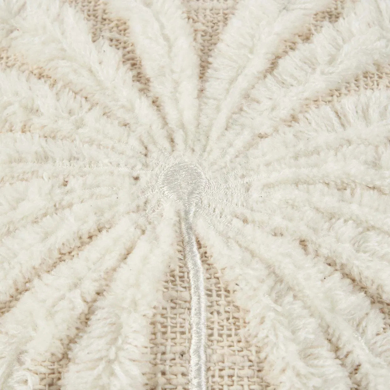 The Isla Palm Cushion Cover — close-up of tufted palm centre detail, ivory cotton loops on natural weave