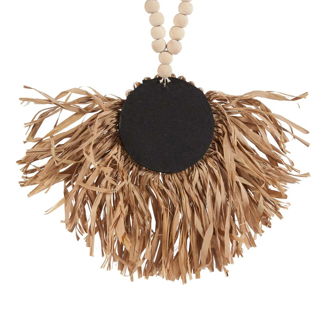 The Raffia Tajoe Tassel — Natural, lifestyle hanging on Mediterranean wall