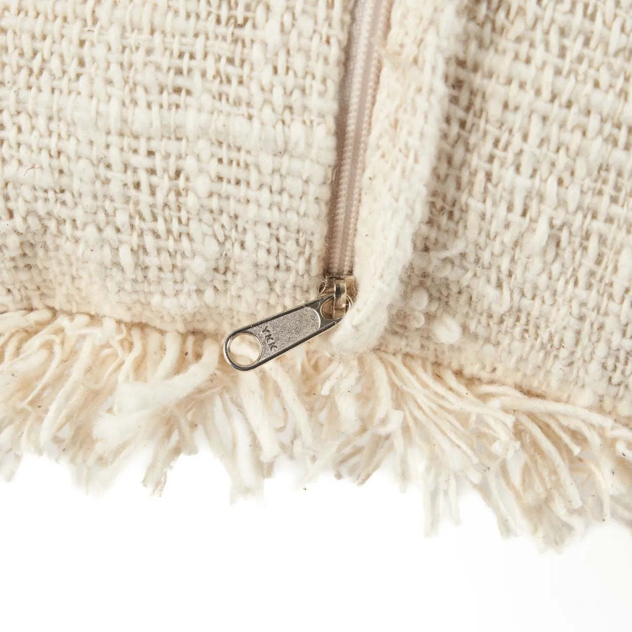 The Gili Palm Cushion Cover — detail of raw-edge fringe border, ivory cotton