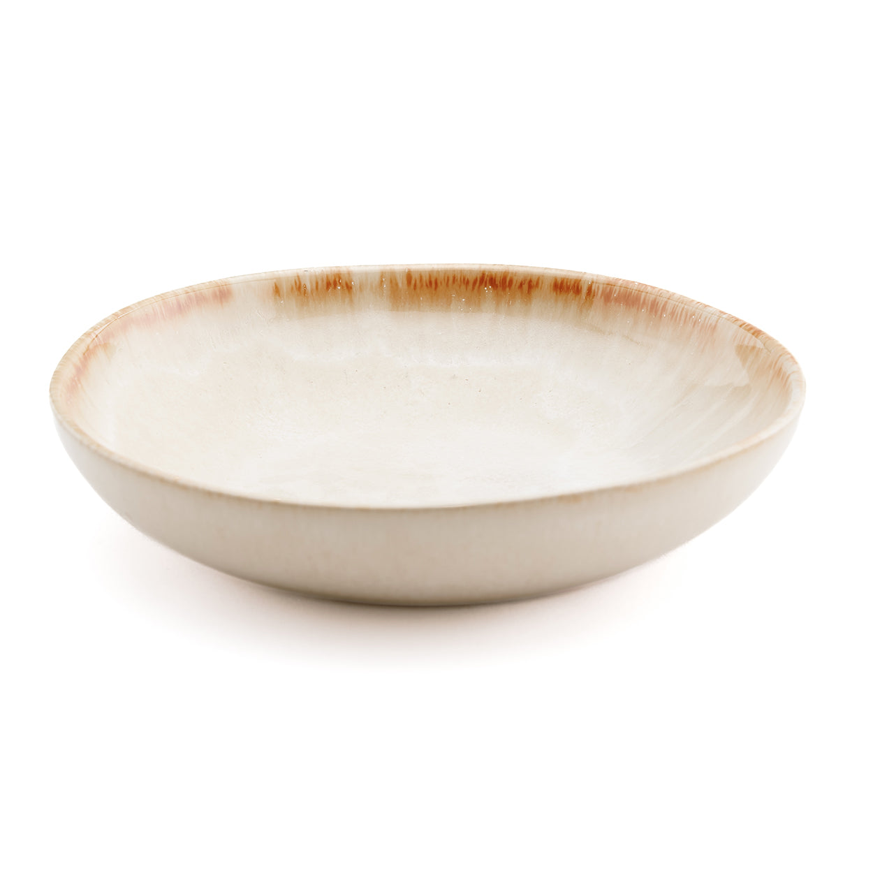 The Cascais Small Bowl Plate styled with green salad and wooden spoon on a dark slate surface