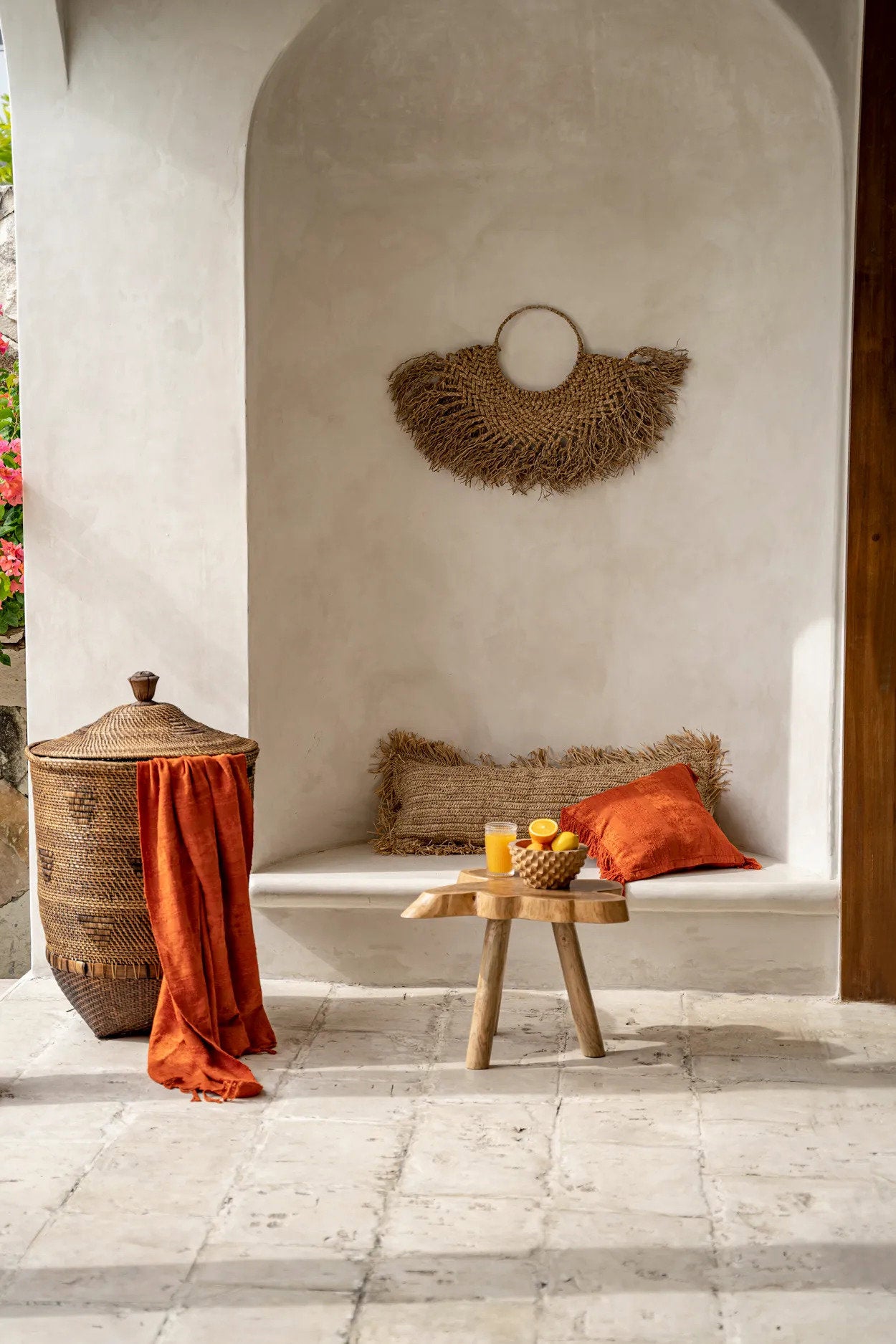Side view of the Colonial Laundry Basket XL showing the cylindrical form and rattan texture