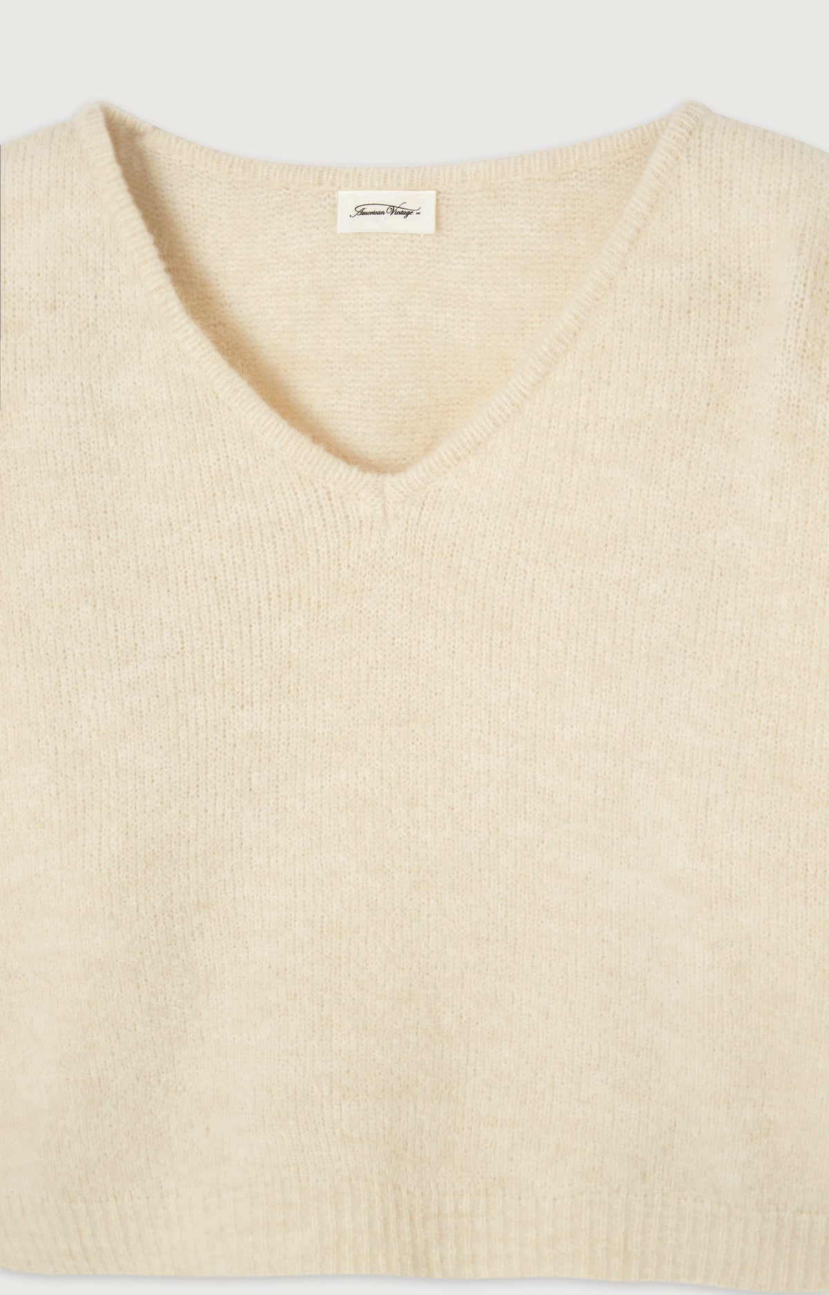 Women's Jumper East Pearl Mélange – V-Ausschnitt Detail