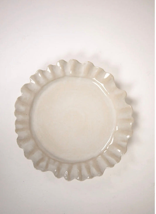 Valerie Dinner Plate White — top view of white stoneware plate with decorative wavy edge on light grey background