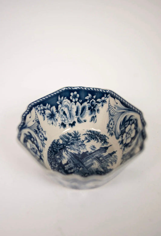 Estelle Bowl Blue — top view of octagonal stoneware bowl with blue toile floral and landscape motif, rope-twist rim on white background