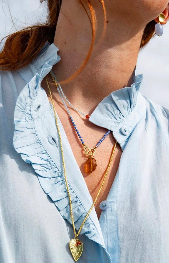 Daring Citrine Necklace – Model wearing layered necklaces
