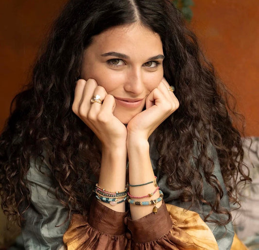 Haze Rose Quartz Bracelet – Model wearing layered bracelets