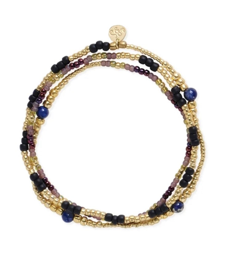 Balanced Lapis Lazuli Bracelet – Triple-wrap beaded bracelet with lapis lazuli on white background